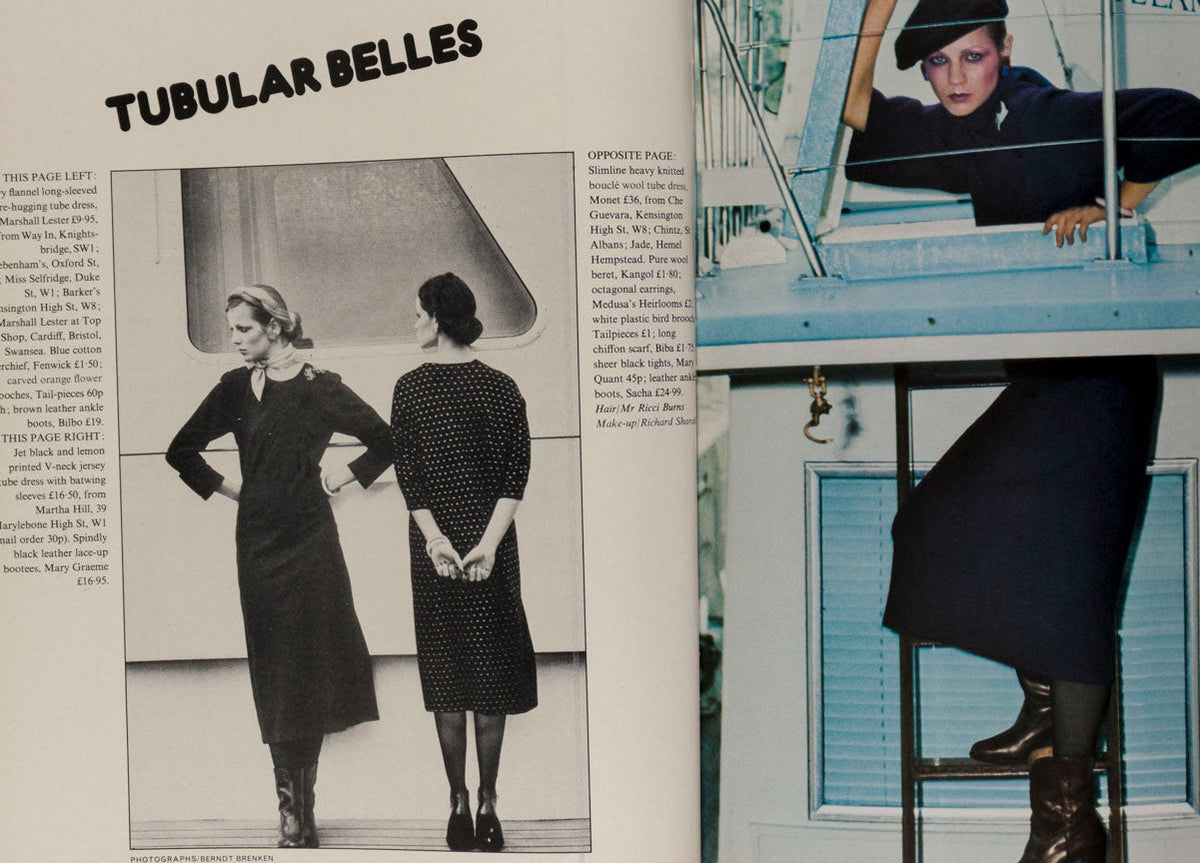 An open vintage magazine spread featuring fashion photography and text. The left page has the headline 'TUBULAR BELLES' above a black-and-white photo of two women in long fitted dresses, with columns of text.